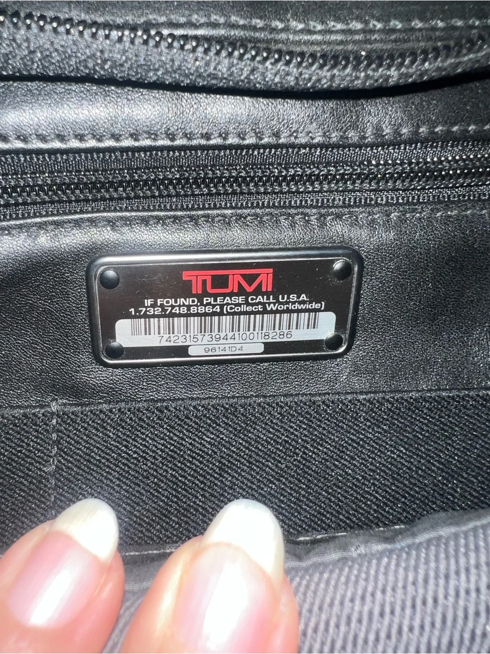 Tumi travel leather briefcase